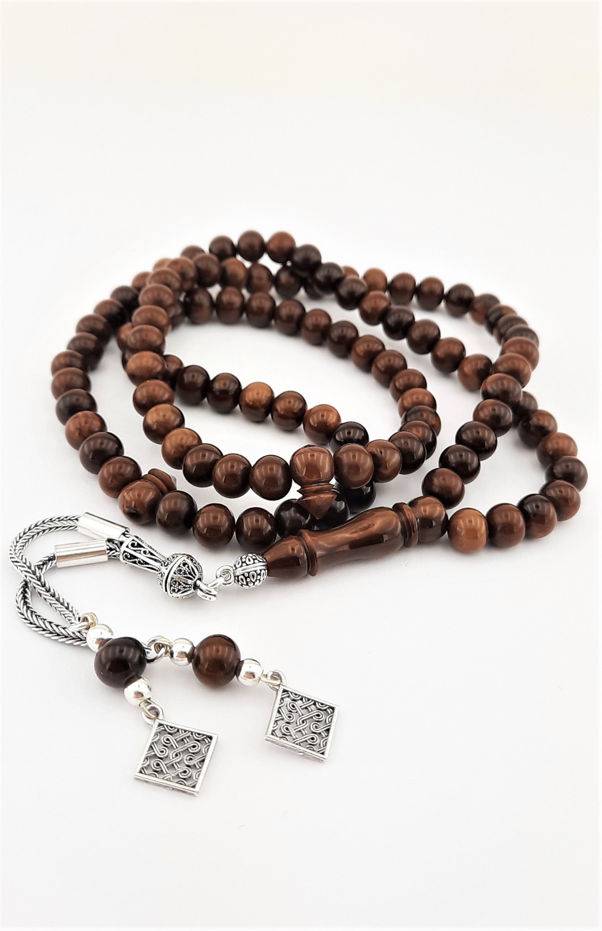 925 Ayar Gümüş Püsküllü Küre Kesim 99'luk Kahverengi Sıkma Kehribar Tespih 925 Ayar Gümüş Püsküllü Küre Kesim 99'luk Kahverengi Sıkma Kehribar Tespih